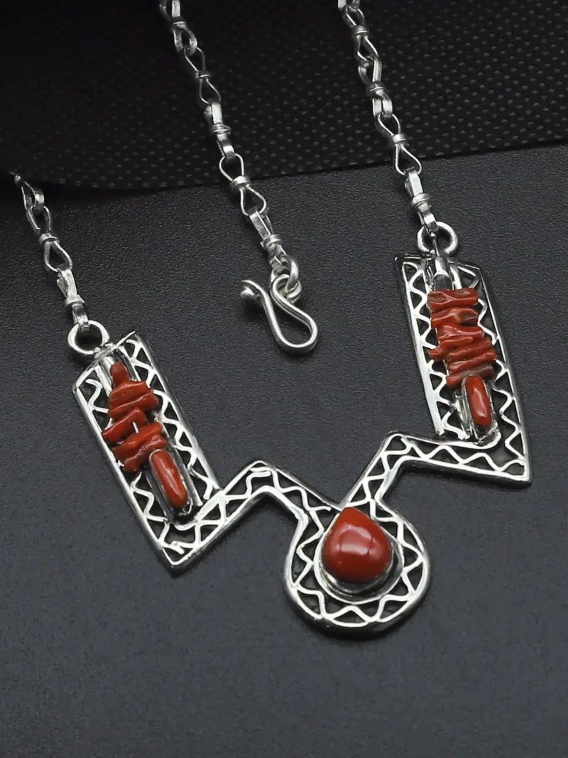 Sculpted Silver Necklace – Coral Accents & Handcrafted Curves
