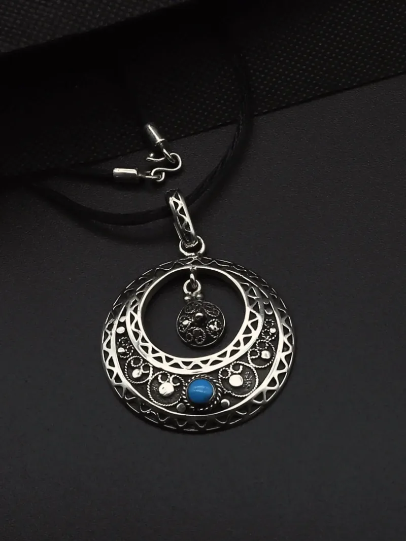 Handmade blue stone silver pendant
