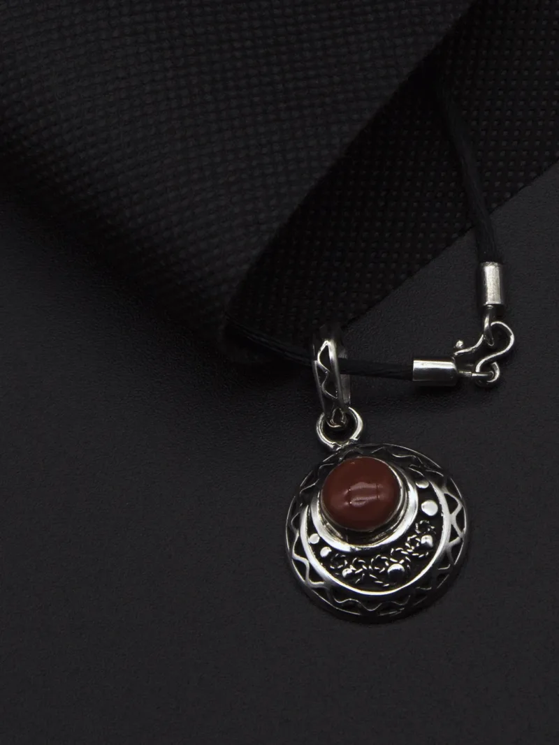 Asymmetric Silver Circle Pendant with Off-Center Red Inlay Stone
